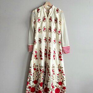 Anarkali suit with red floral embroidery. East Indian outfit.